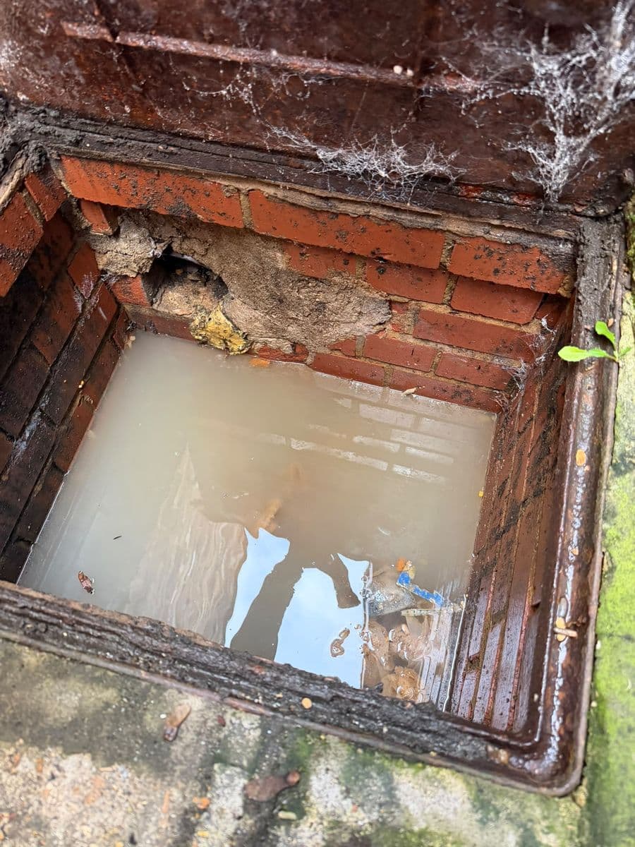 Brick inspection chamber flooded before clearing