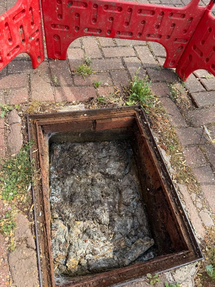 Inspection chamber full of waste before a blockage was cleared